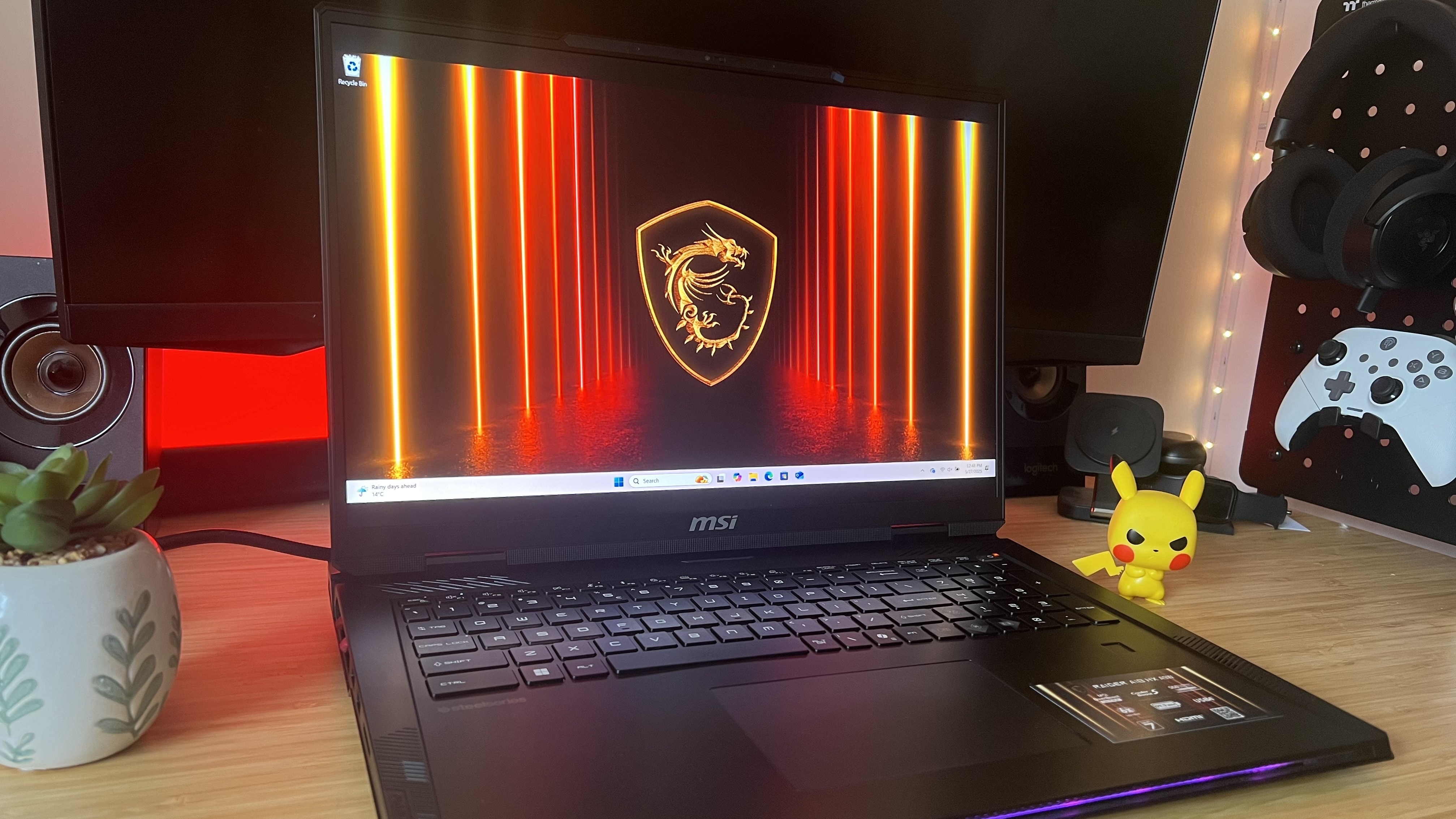MSI Raider A18 HX gaming laptop on a wooden desk