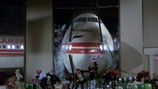 Airplane crashes through terminal