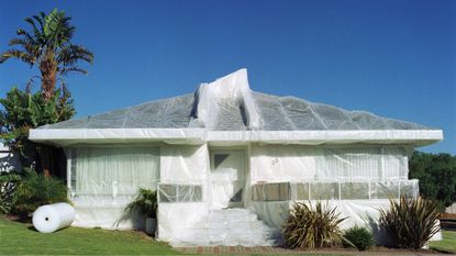 A home is wrapped in bubble wrap.