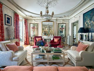 Opulent living room with sofas and armchairs in Parisian apartment belonging to Timothy Corrigan
