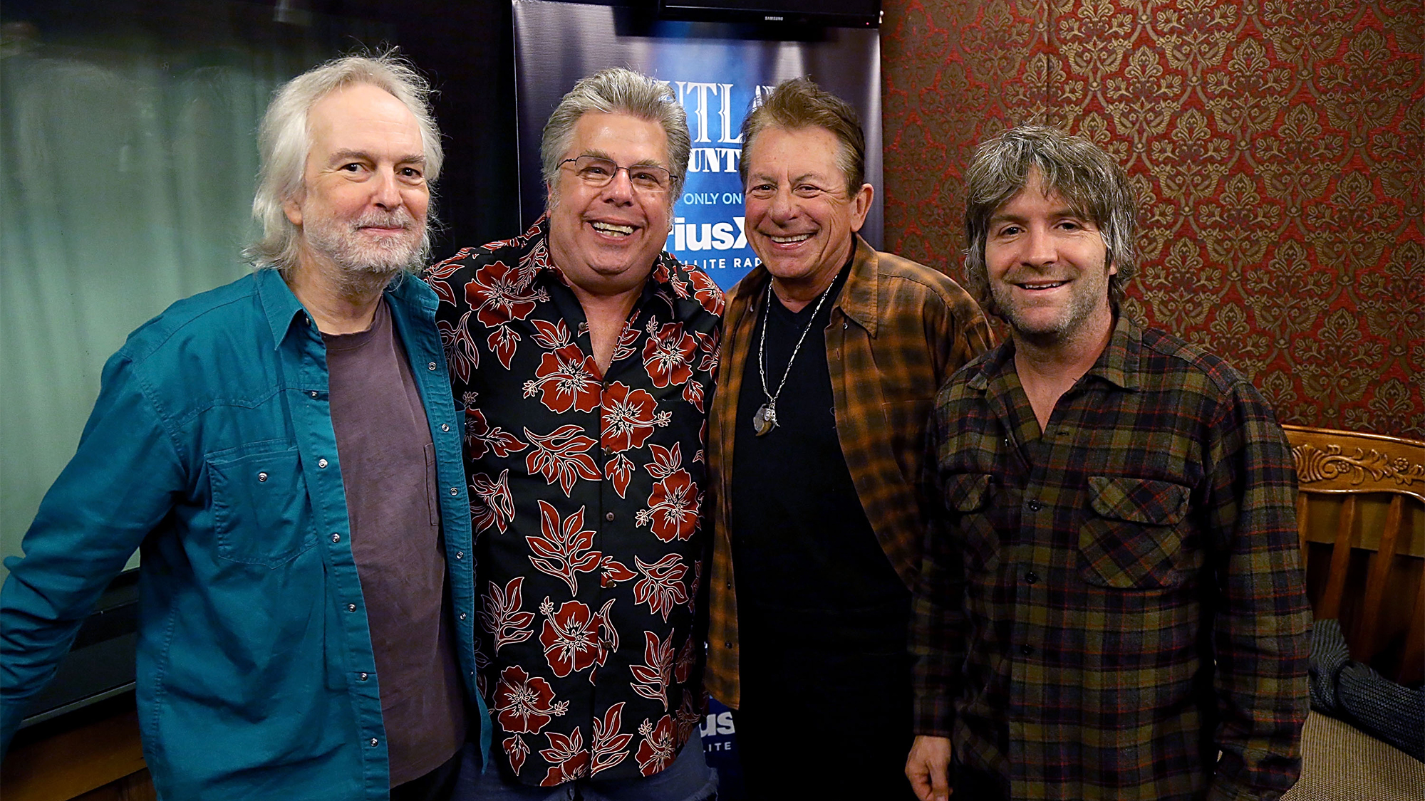 (L - R) Gurf Morlix, Mojo Nixon, Joe Ely and Tim Easton pose in the studio during the Celebration of Mojo's 10 Year Anniversary on SiriusXM during A special live show at the SiriusXM Studios on November 12, 2014 in Austin, Texas.