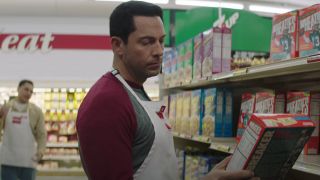 Zachary Levi as kurt warner stocking grocery shelves american underdog