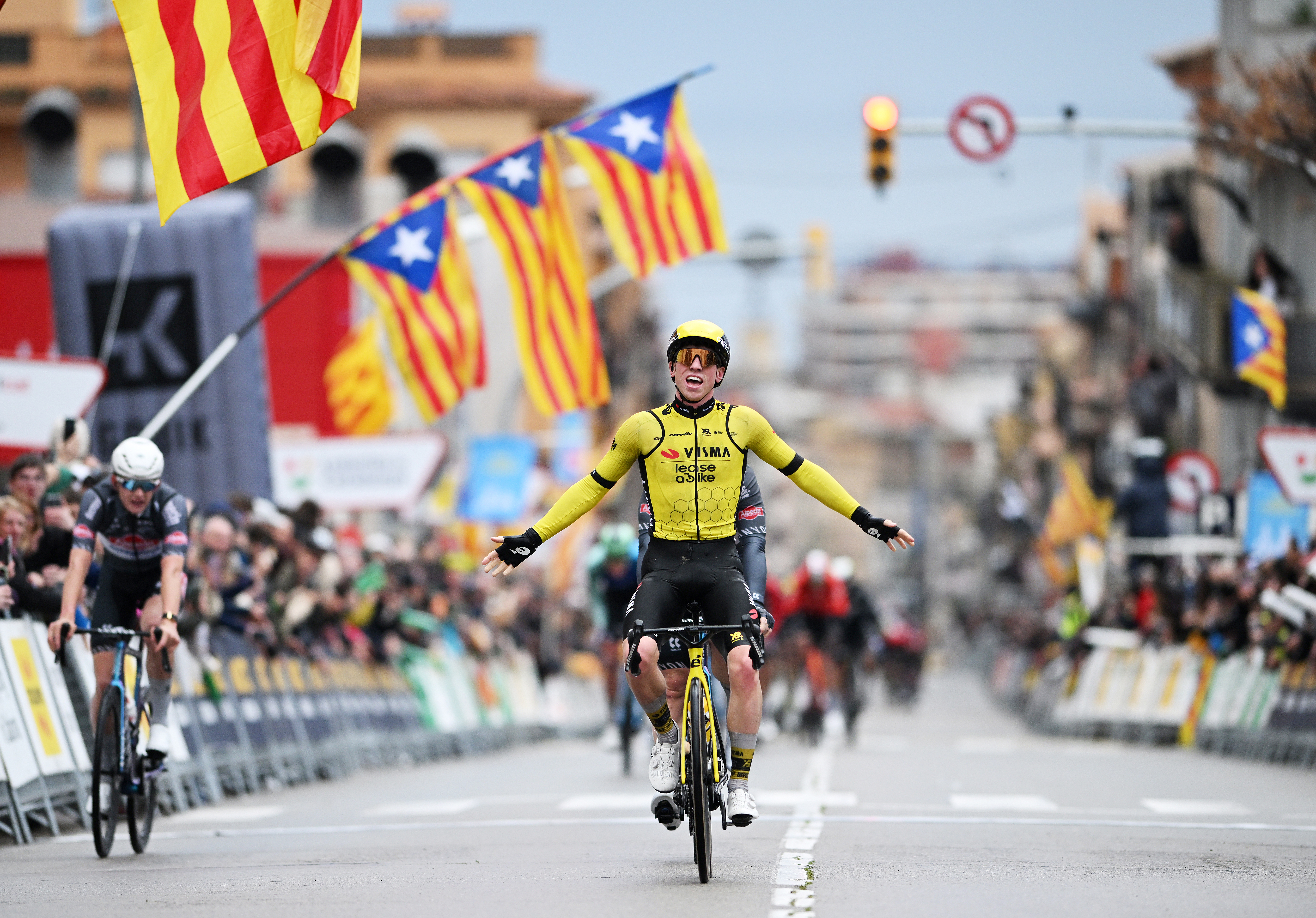SANT FELIU DE GUIXOLS, SPAIN - MARCH 24: Matthew Brennan of United Kingdom and Team Visma | Lease A Bike celebrates at finish line as stage winner during the 104th Volta Ciclista a Catalunya 2025, Stage 1 a 178.6km stage from Sant Feliu de Guixols to Sant Feliu de Guixols / #UCIWT / on March 24, 2025 in Sant Feliu de Guixols, Spain. (Photo by Szymon Gruchalski/Getty Images)