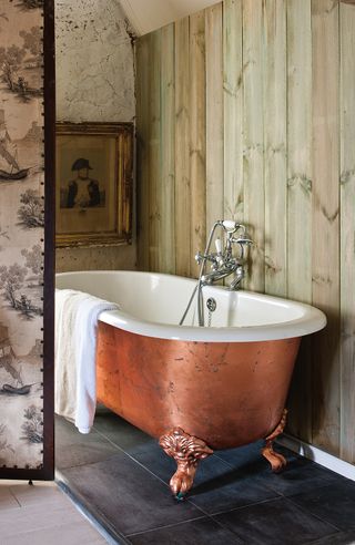 Annie Sloan bathroom with copper-effect tub