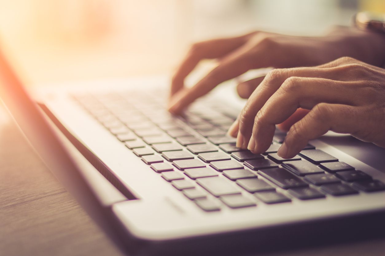 A person using a computer. 