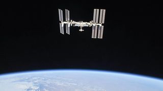 A view of the ISS above the Earth.