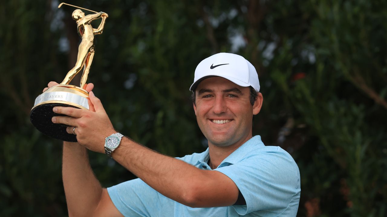 Scottie Scheffler with the trophy after winning the 2023 Players Championship at TPC Sawgrass