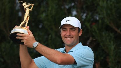 Scottie Scheffler with the trophy after winning the 2023 Players Championship at TPC Sawgrass