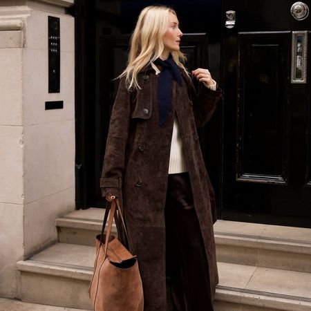 Woman wears pieces from the Rise & Fall Black Friday sale