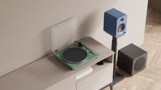 Kanto Obi3 turntable flanked by Kanto speakers