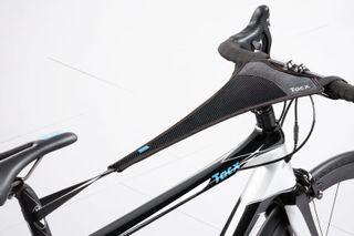 Tacx Sweat Cover Attached to an indoor bike