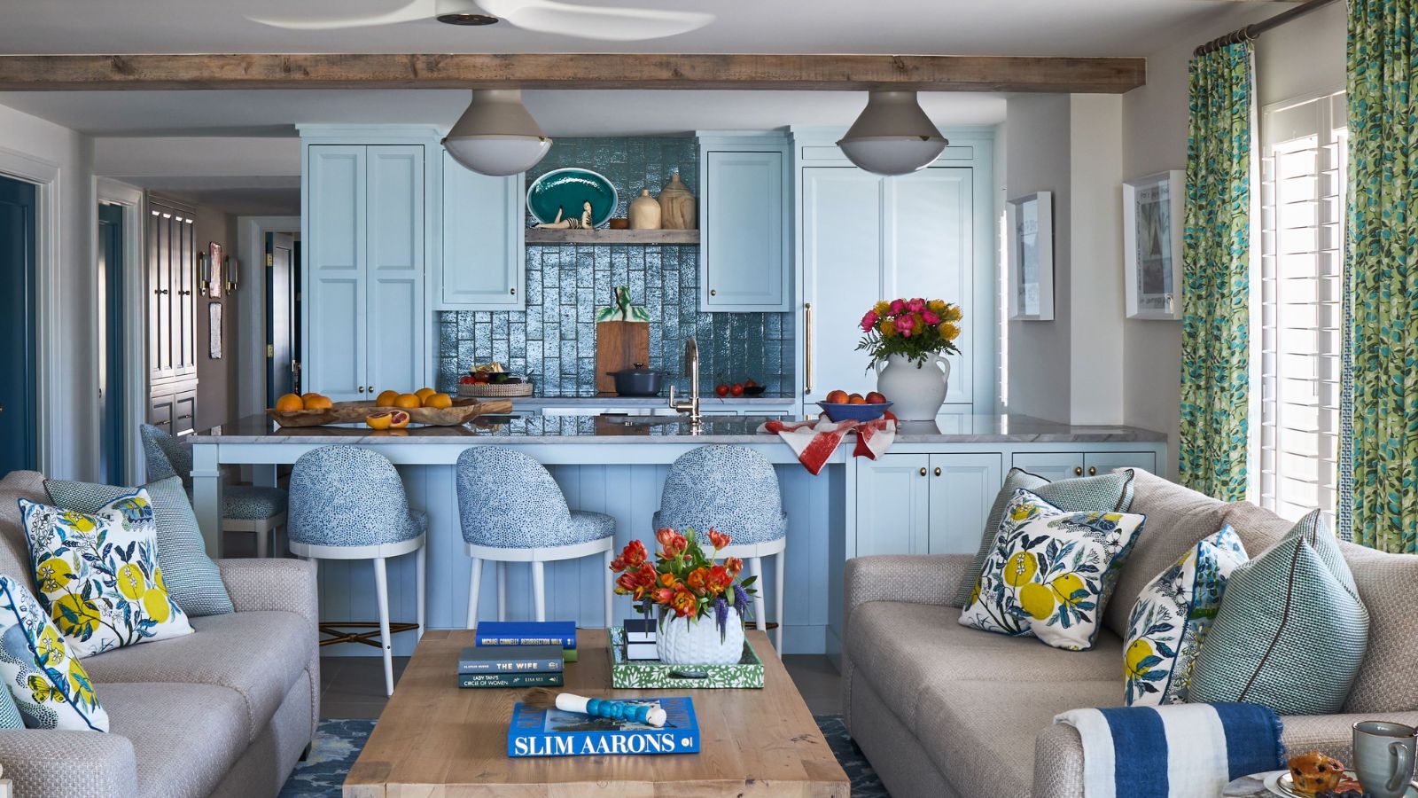An open plan kitchen painted in Ocean Aire 2123-50 by Benjamin Moore