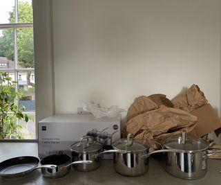 M&S Stainless Steel Pan Set with the packaging on the counter