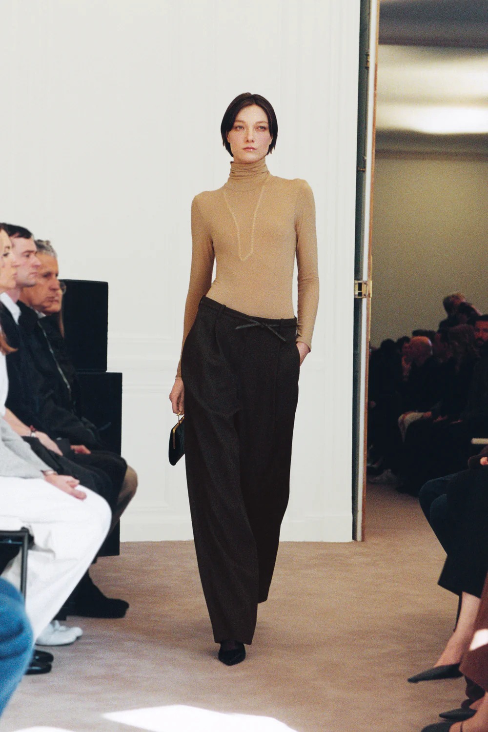 The Row model walks the Winter 2026 runway during Paris Fashion Week