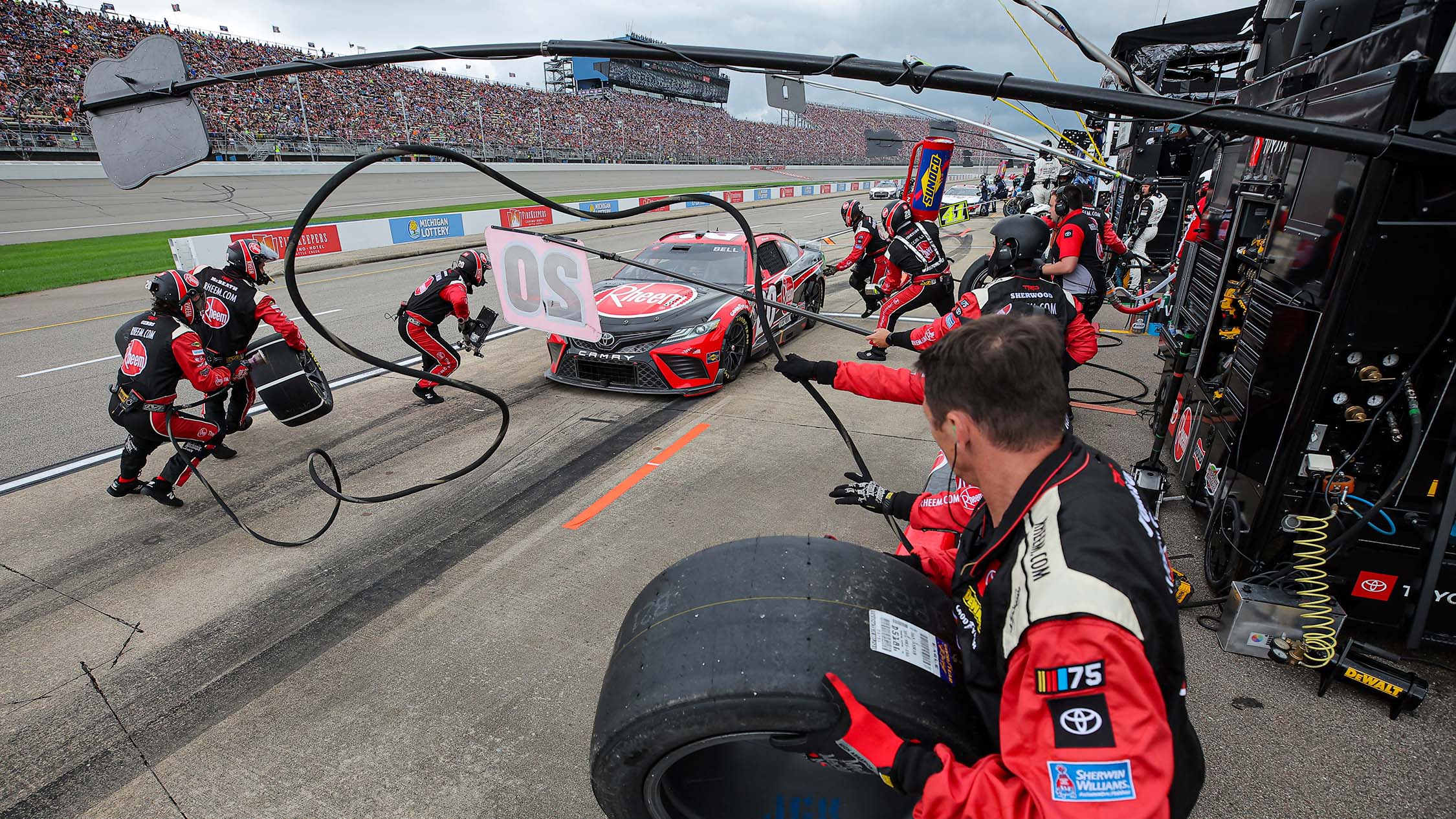 BROOKLYN, MICHIGAN - AUGUST 06: Christopher Bell, driver of the #20 Rheem Toyota, pits during the NASCAR Cup Series FireKeepers Casino 400 at Michigan International Speedway on August 06, 2023 in Brooklyn, Michigan. (Photo by Jonathan Bachman/Getty Images)
