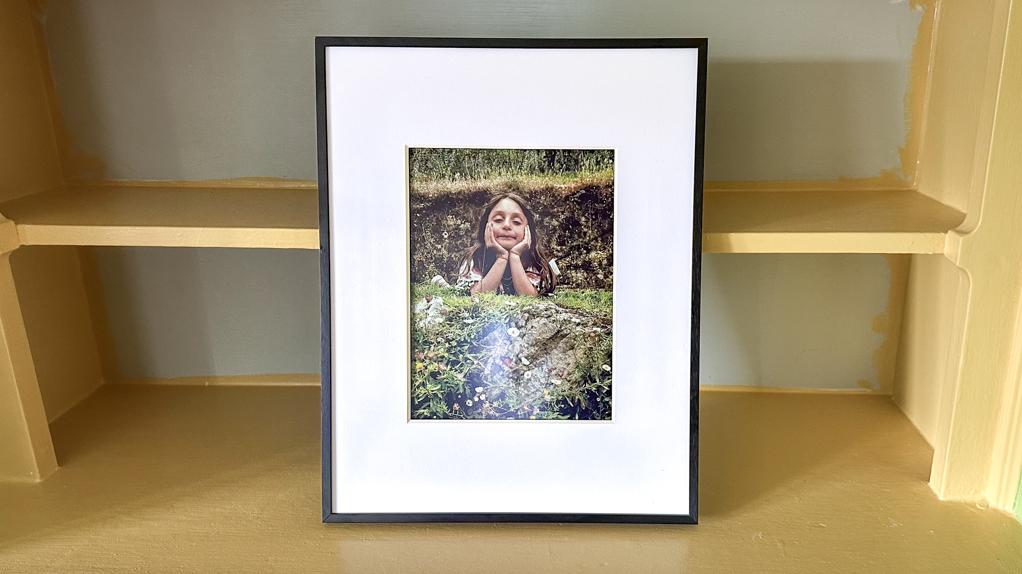 Aluratek ePaper 13.3 inch Wifi Digital Photo Frame on a shelf