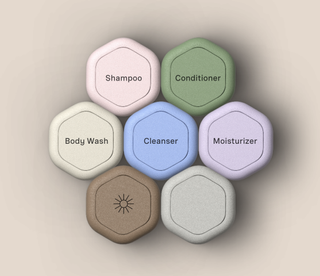 Seven medium capsules that form the Cadence Honeycomb magnetic travel set