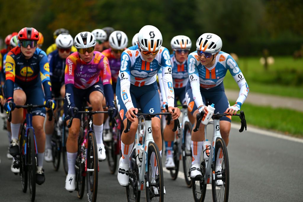 DOETINCHEM NETHERLANDS OCTOBER 12 LR Silje Bader of The Netherlands and Maeve Plouffe of Australia and Team dsmfirmenich PostNL compete during the 26th Simac Ladies Tour 2024 Stage 5 a 140km stage from Doetinchem to Doetinchem UCIWWT on October 12 2024 in Doetinchem Netherlands Photo by Luc ClaessenGetty Images