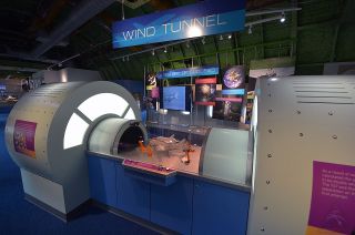 One of the new hands-on exhibits inside NASA’s original Shuttle Carrier Aircraft at Space Center Houston replicates a wind tunnel like the type NASA used to ensure the jumbo jet could safely fly with the space shuttle.