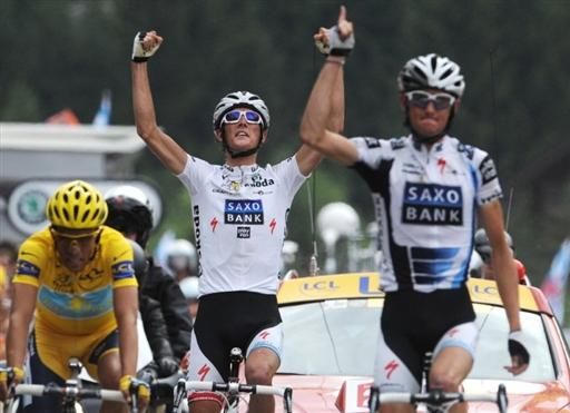Fr&auml;nk Schleck (Saxo Bank) celebrates his stage win while brother and teammate Andy Schleck, third place behind Contador, looks equally as ecstatic.
