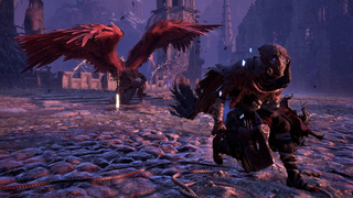 A pyromancer from Lords of the Fallen crouches in front of a recently-slain boss.
