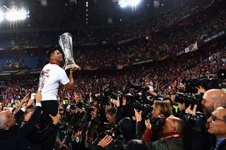 Team captain Jose Antonio Reyes of Sevilla poses for photograhs with the trophy after the UEFA Europa League Final match between Liverpool and Sevilla at St. Jakob-Park on May 18, 2016 in Basel, Switzerland.
