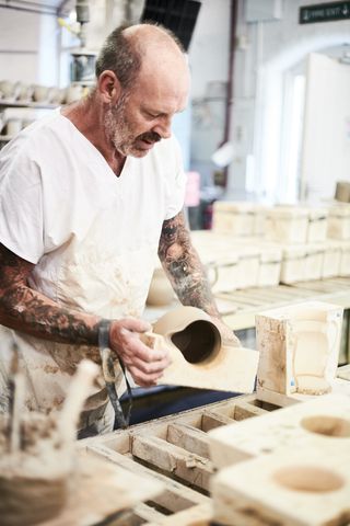 man moulding pots emma bridgewater factory