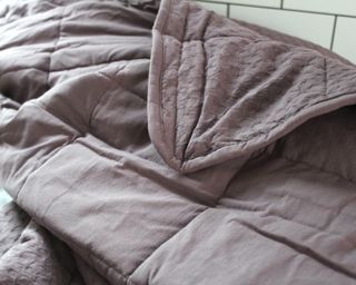 Close-up of purple weighted blanket