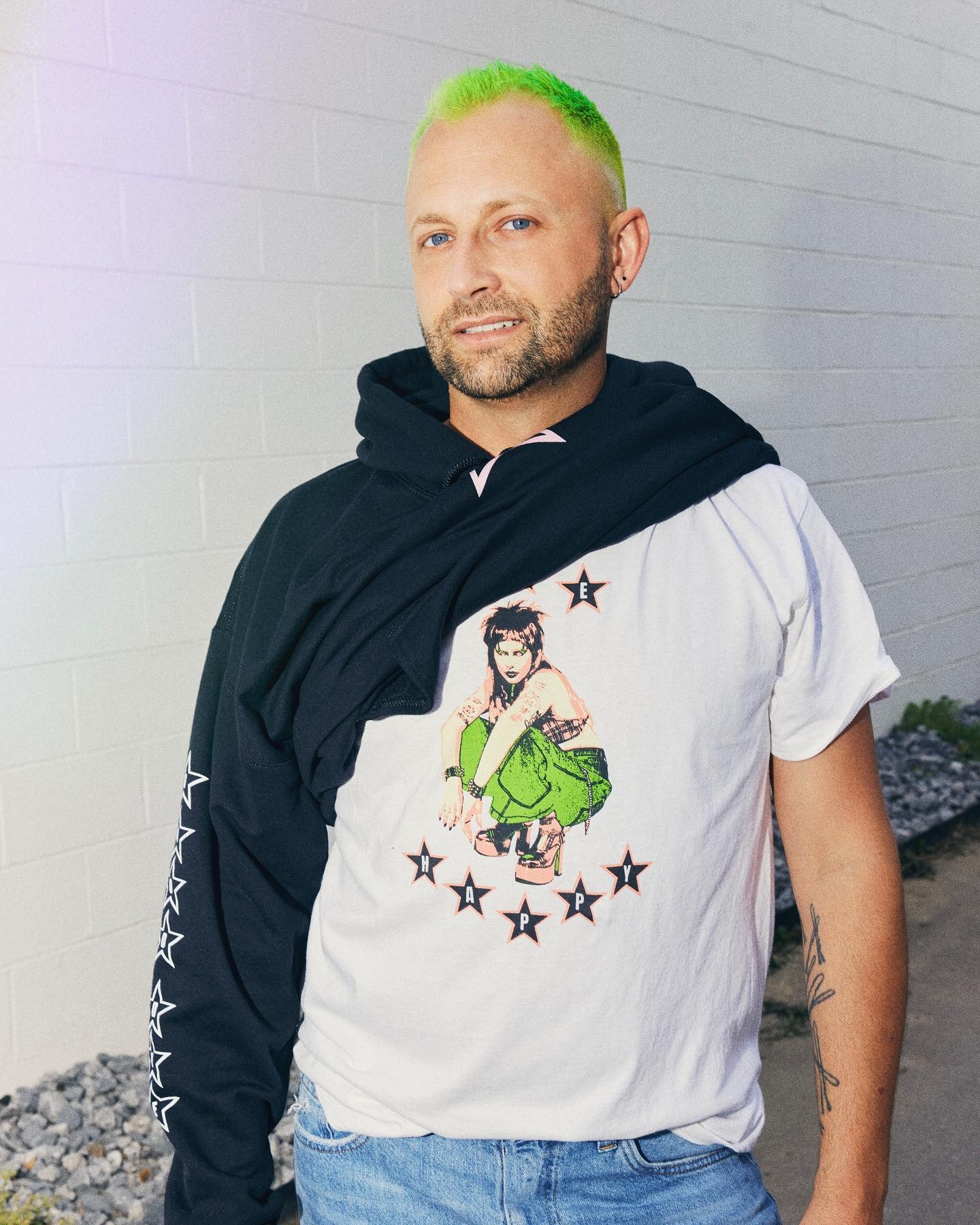 Photo of Brian O'Conner, wearing Good Dye Young merch with green hair.