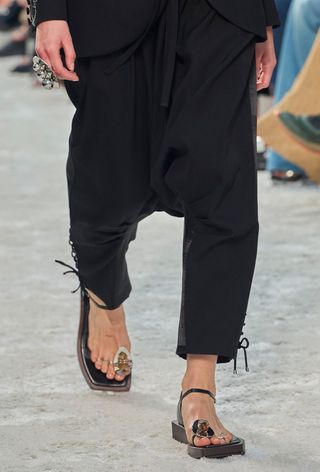 hardware sandal trend worn by a model on the Rabanne S/S 24 runway