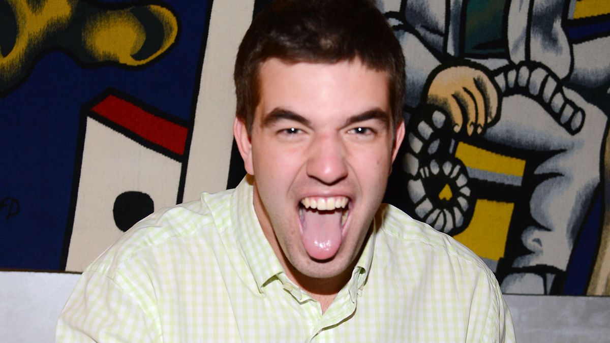 A photo of Fyre Fest&#039;s Billy McFarland sticking his tongue out in 2014