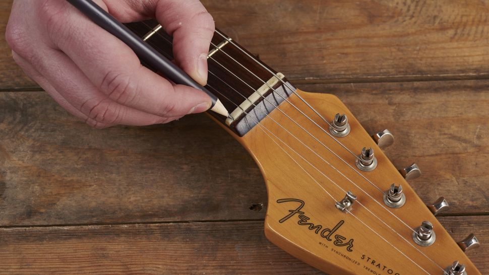 10 guitar setup hacks tips on changing strings and staying in tune