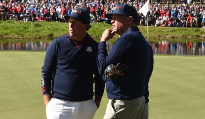 Mickelson chats with Love III at the Ryder Cup