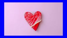 image of condom on a red heart shaped object