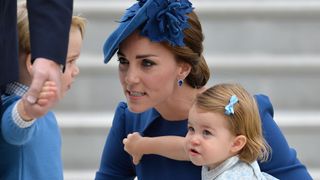 Catherine, Duchess of Cambridge, Princess Charlotte of Cambridge and Prince George of Cambridge arrive at Victoria Airport