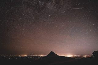Eta Aquarid meteors dash over the Port Hills of Christchurch, New Zealand, on May 6, 2017.
