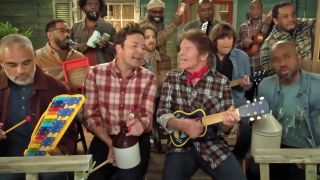 John Fogerty, Jimmy Fallon and The Roots playing toy instruments