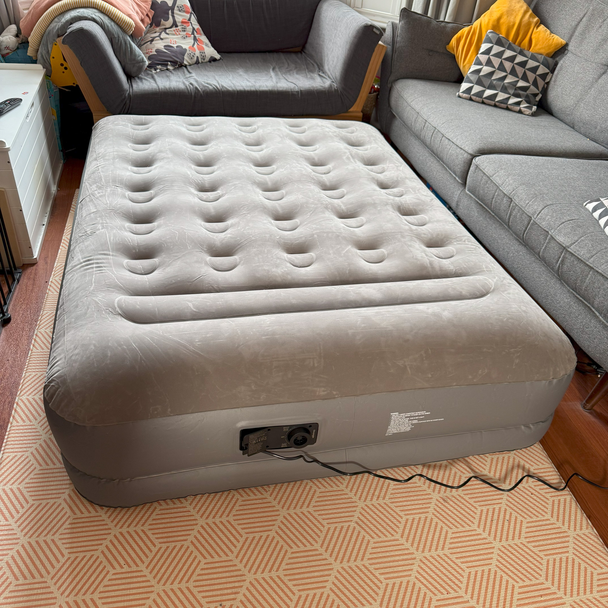 The Silentnight Extra High Flocked Airbed being tested