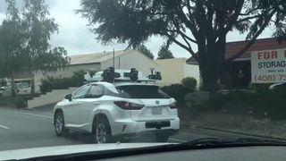 A car decked out with Apple's self-driving tech