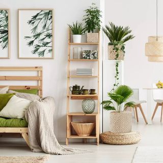 Green and neutral living room featuring Target's macrame storage baskets