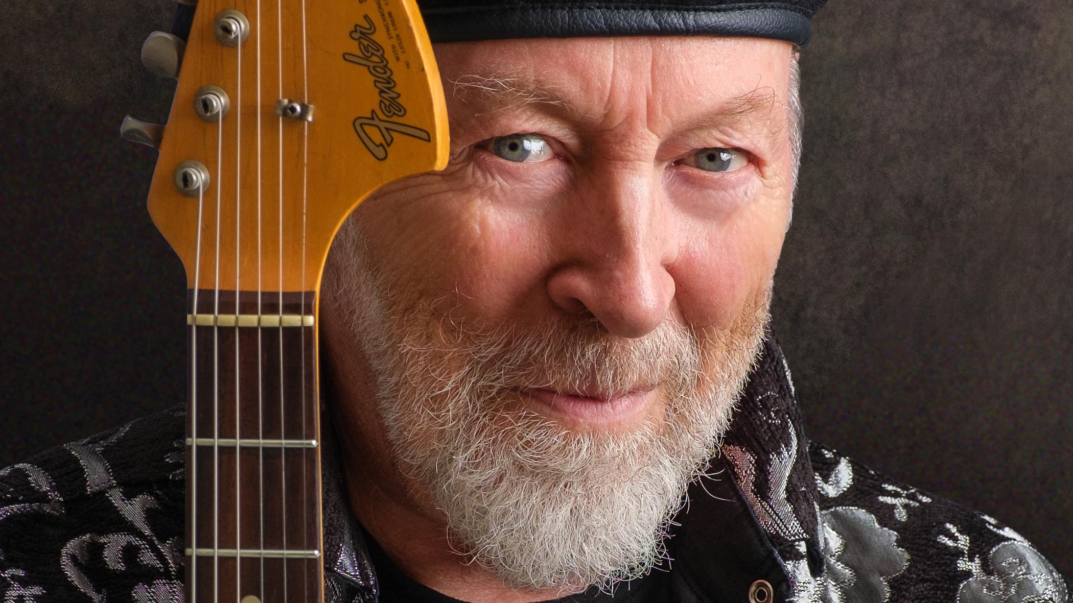 Folk icon Richard Thompson is pictured wearing his trademark hat, with his trademark Stratocaster.