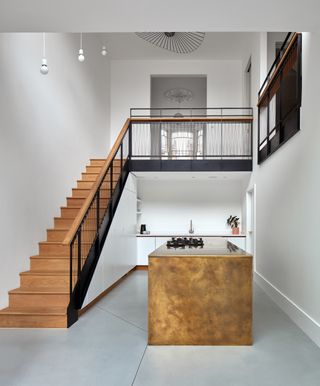 Timber and steel staircase in kitchen idea