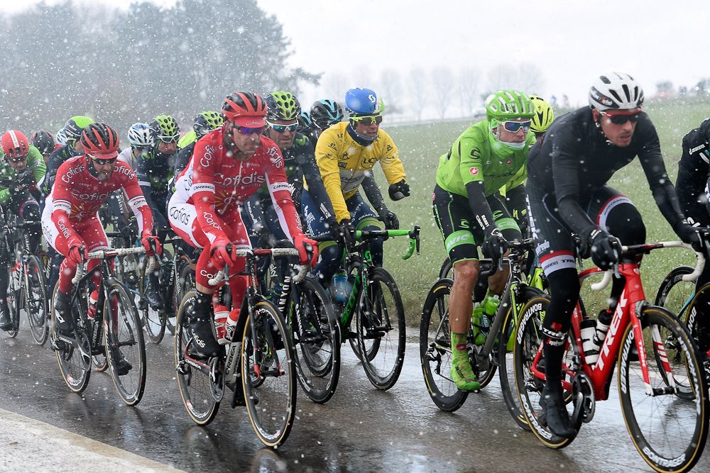 Michael Matthews and the peloton endure snow during stage 1 at Paris-Nice.