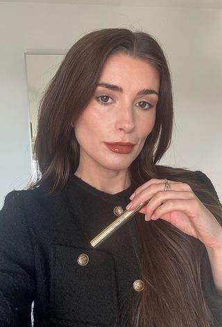 Eleanor wearing Hourglass Phantom Glossy Balm in shade Trace