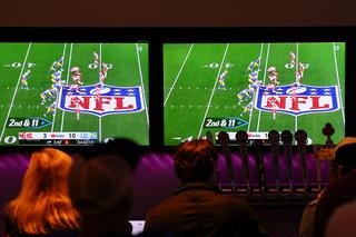 BUFFALO, NEW YORK - SEPTEMBER 05: Bar patrons watch the YouTube TV telecast of the game between the Kansas City Chiefs and the Los Angeles Chargers on September 05, 2025 in Buffalo, New York. (Photo by Aaron M. Sprecher/Getty Images)
