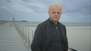 Toby Jones photographed on a beach