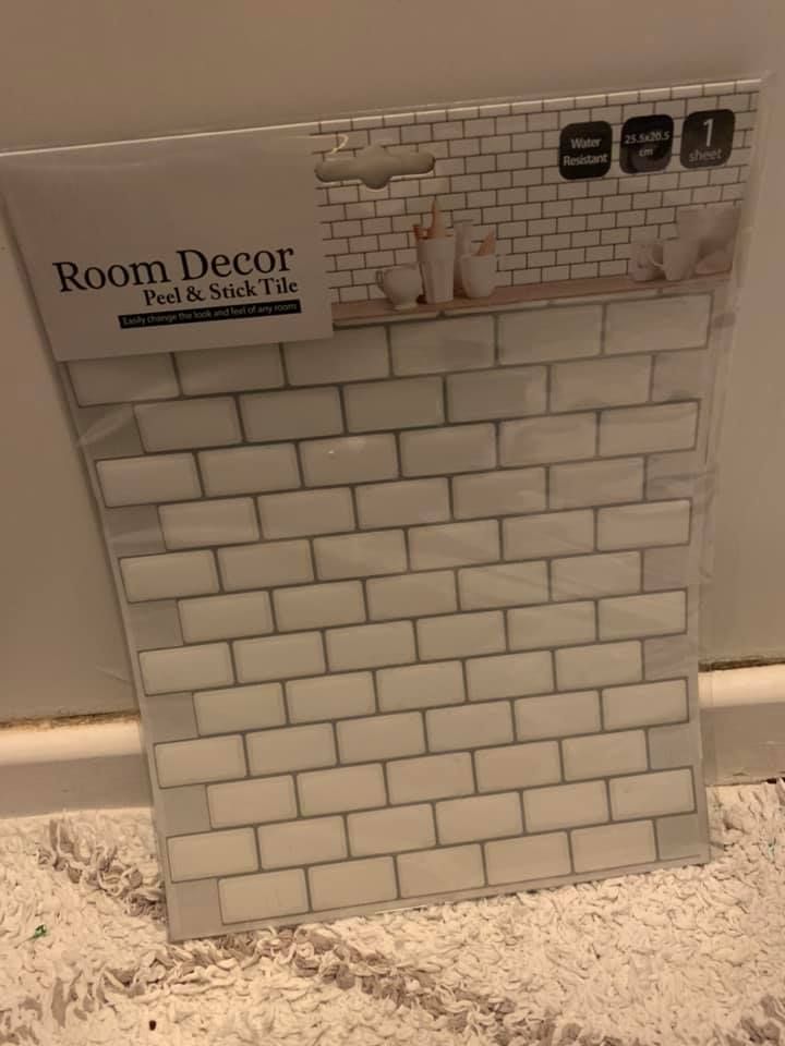 Thrifty mum transforms bathroom for £15 with Poundland stickon wall