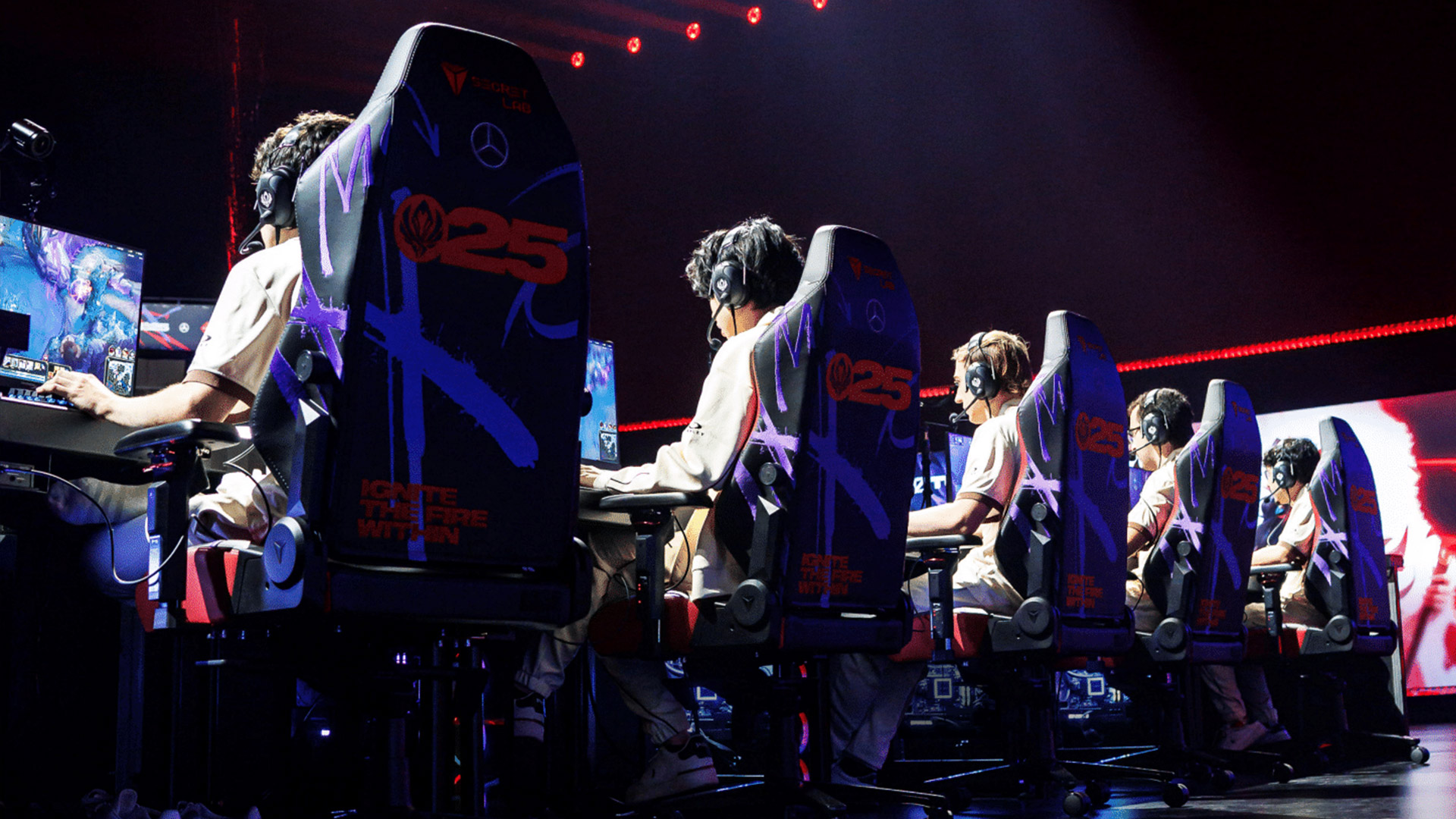 A row of esports gamers at a tournament with the new Secretlab Infinite Precision Armrests