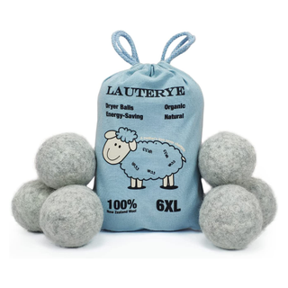 A light blue fabric drawstring bag with 6 wool dryer balls