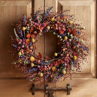 Preserved flax, daisy, strawflower, and amaranthus wreath | $138 from Anthropologie